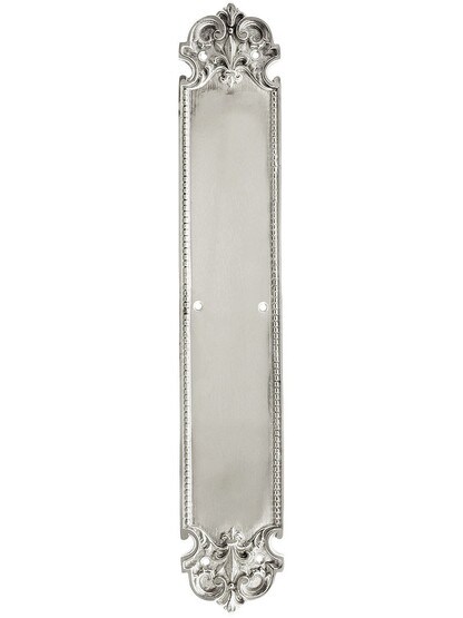 French Baroque Push Plate In Polished Nickel.